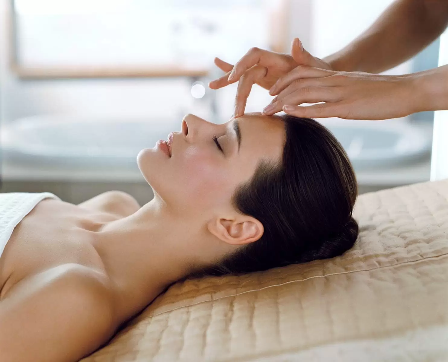 Lady receiving a treatment in a SPA