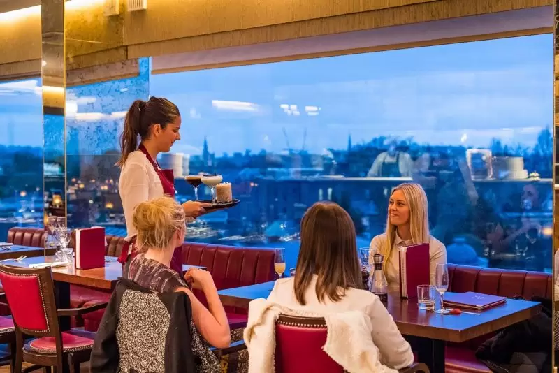 women having cocktails
