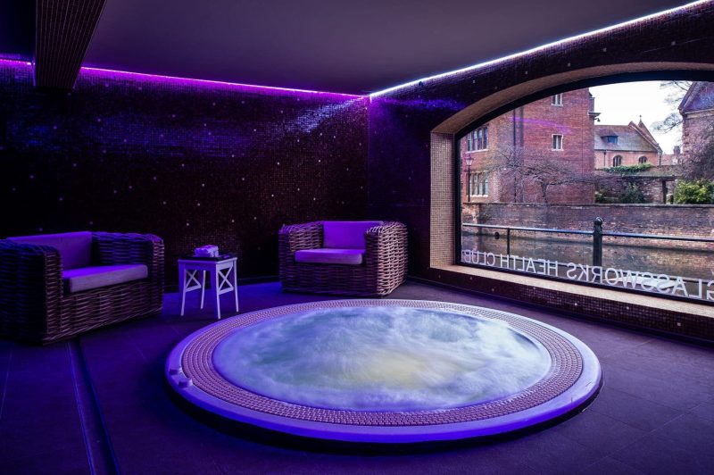 Jacuzzi tub with bubbles in The Glassworks Gym & SPA