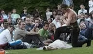 Actor on one knee with crowd