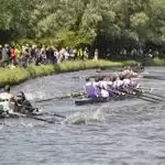 team rowing on the river cam