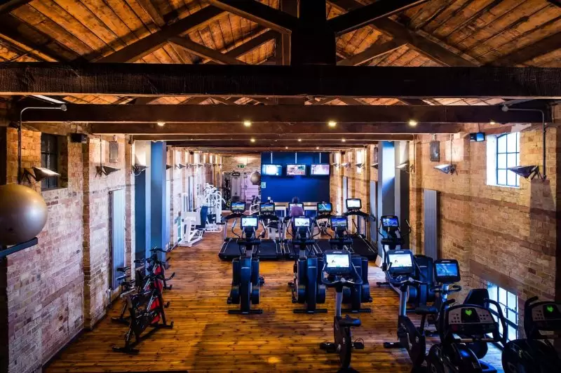 the gym showing bikes and treadmills