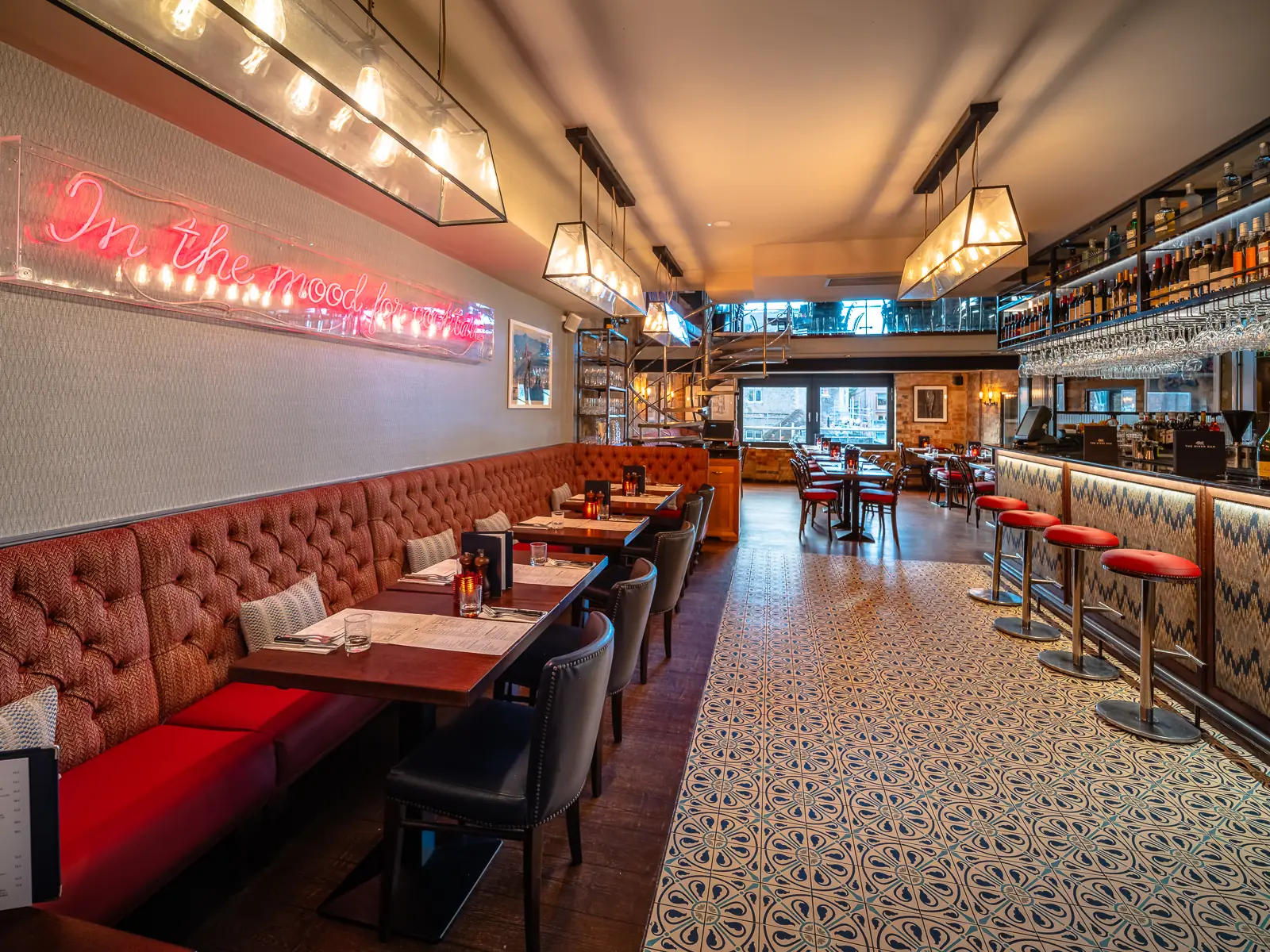 river bar steakhouse bar area with high stools at the bar
