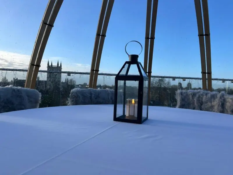 cosy rooftop dome with lantern and blue skies in the background