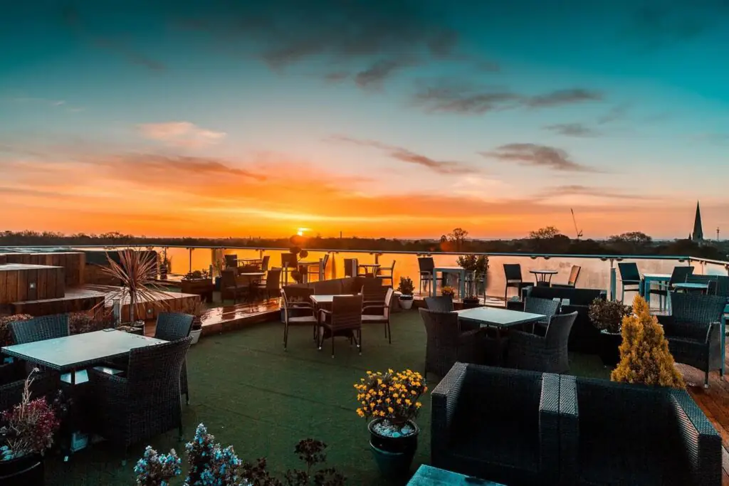 Roof terrace at the Varsity Hotel & Spa during a summer sunset